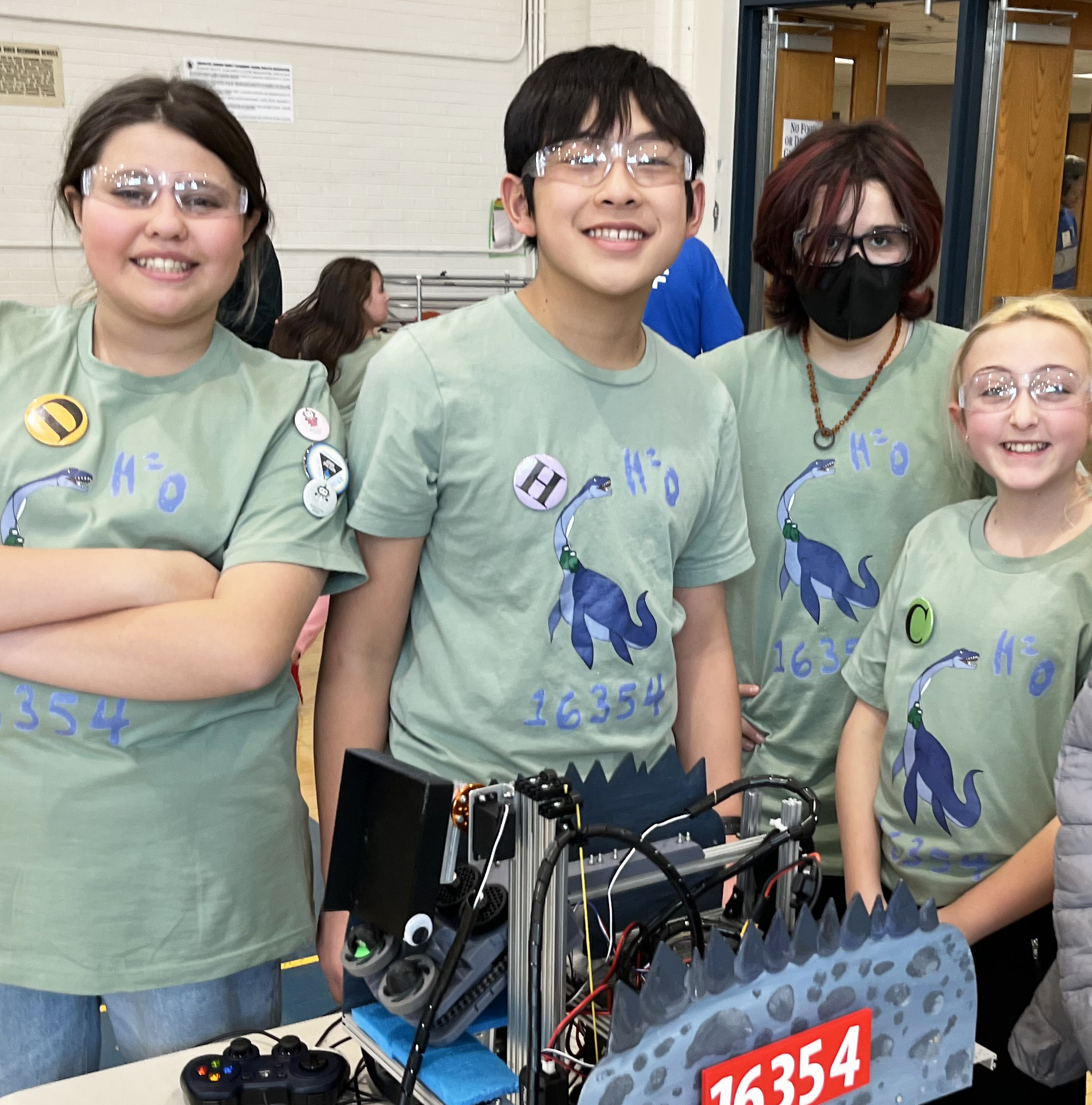 CC4HR robotics team members with their robot