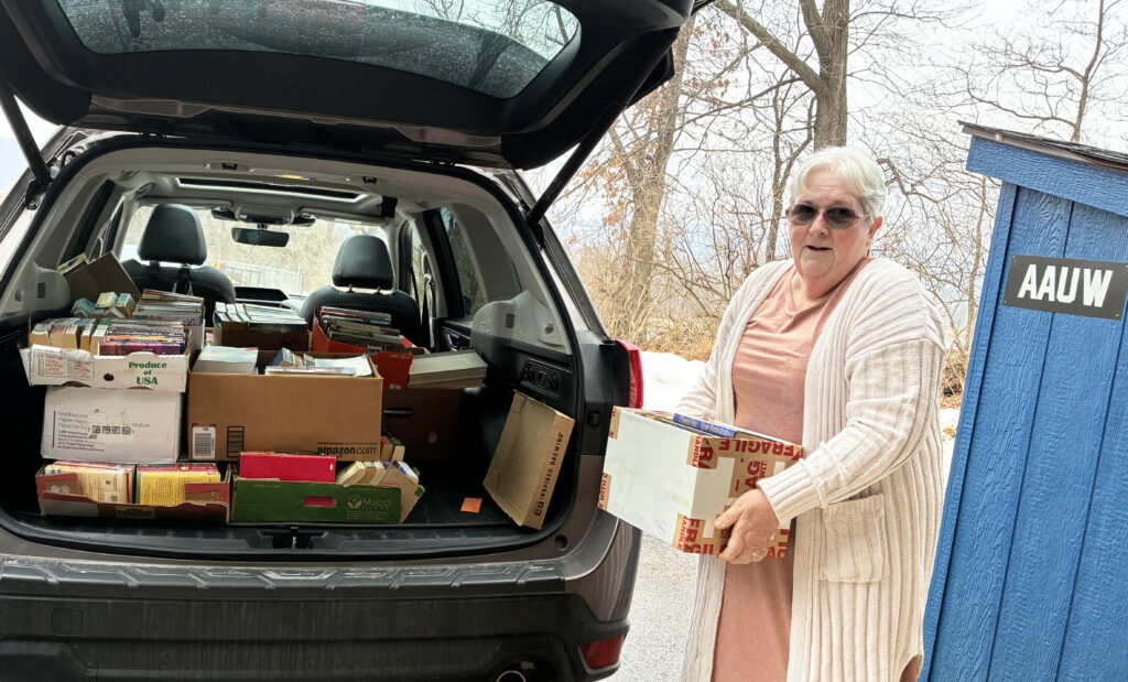 Couple making a book donation